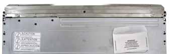 until disengaged from the drawer guides. Note: When in the closed position, the strike on the back of the drawer is captured by the roller catch. The strike is riveted in place and is not adjustable.