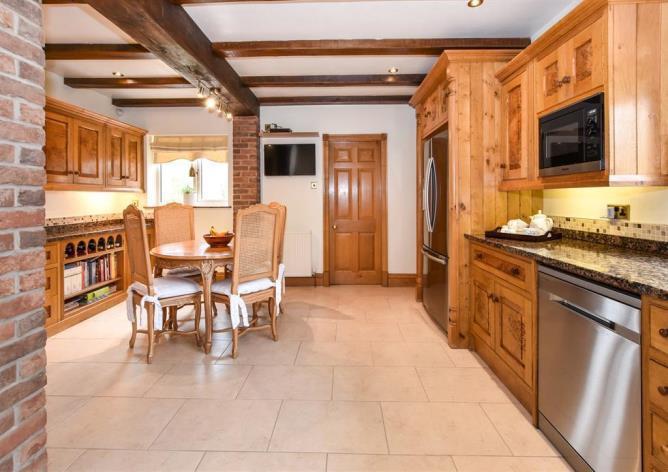 The superb property is spread over 3000 square feet and is fitted to an extremely high standard with bespoke kitchen and bedrooms which feature solid oak by 'Peter Thompson of York'.