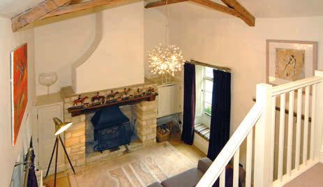 Attractive first floor landing with window and useful under eaves storage cupboards. Substantial master bedroom open to the eaves with exposed beams and cast iron chamber fireplace.