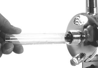 NOTE: It is advisable to support the quartz sleeve on the opposite end with your finger so that it does not drop to the bottom of the chamber as it slides into the chamber. 7.