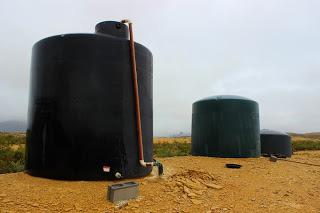 greenhouse, pumped into large water storage tanks and