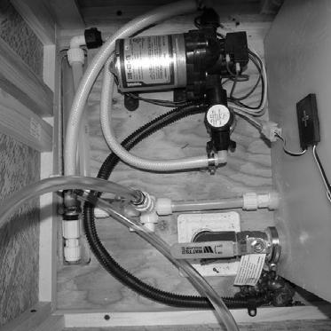 SECTION 7 PLUMBING 2. Turn water pump switch to OFF position. 3. Fill water tank. 4. Open all faucets, hot and cold. 5. Turn on water pump switch. 6.