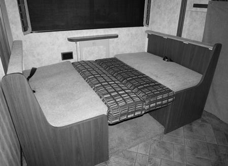 U-SHAPED DINETTE/BED CONVERSION If Equipped (Typical view your coach may differ) The U-Shaped Dinette can be
