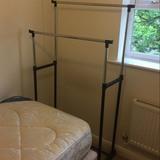 unit One clothes rail One single bed