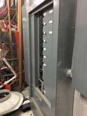 The panel type is Cutler Hammer B. The second service located in the newest 2004 addition feeds the 1954 and 2004 additions. This service is 600 amps and is a 102/208 volt 3 phase 4 wire.