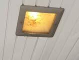 We noted varying lamp color in fixtures, a lot of burnt out ballasts and lamps. Lenses and fixtures are aged with the building construction. D.
