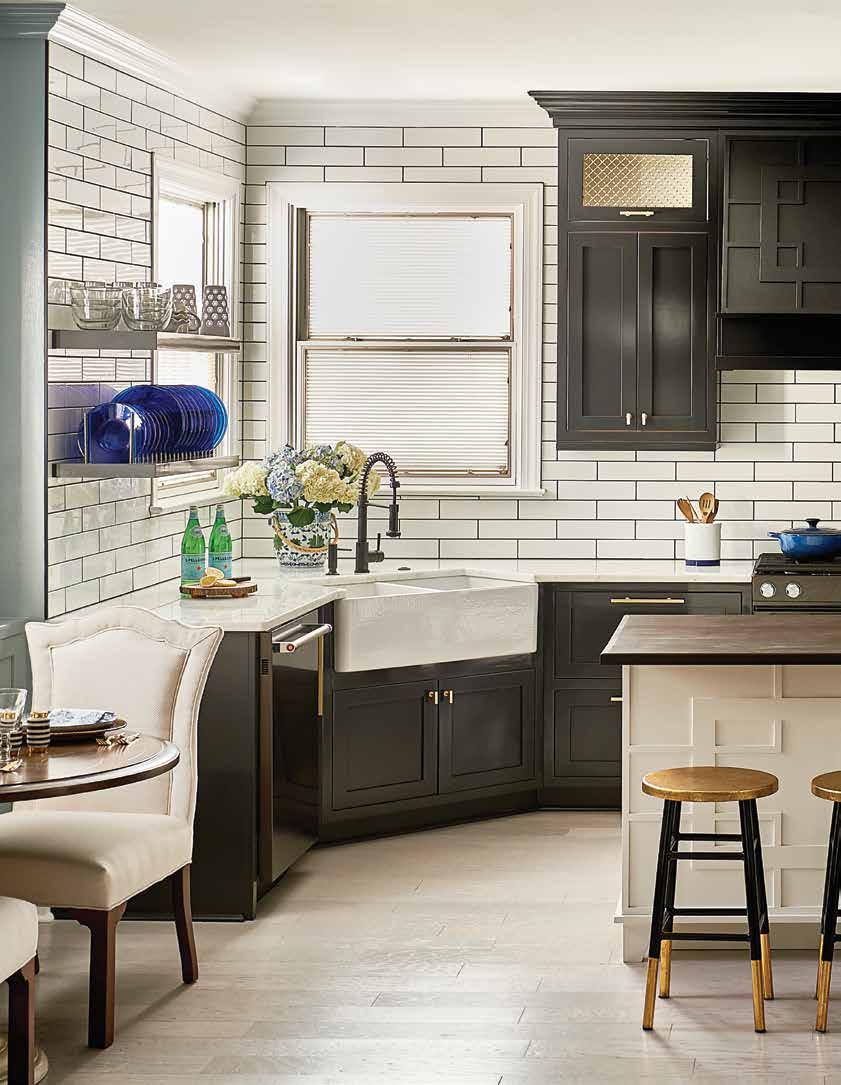 The robin s egg blue high gloss lacquer is Benjamin Moore Stardew, the perfect contrast for this dramatic black kitchen.
