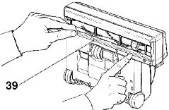 The cover release flap must remain in a forward pulled-out position to change dust bags and lock them into place.