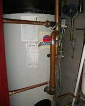 Top right: example of unlagged pipes on an hot water boiler Right: electric instant hot water unit provides on demand hot water Make sure that your hot water tank is insulated with a hot