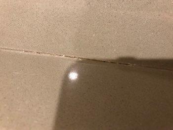 Indications of past patching to wall right of sink 2. Counter Condition Counter tops are in good condition.