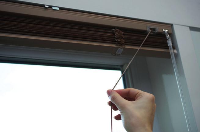 Operating your blind LOWERING To unlock the cords, pull towards the centre of the blind and release gently through the hand until the required drop is reached.