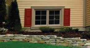 Landscaping and Surface Water Management Window Wells To avoid the risk of water infiltration through basement windows, it is important to allow at least 200 mm (8 inches) of space between the