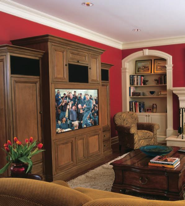 The cozy family room is the perfect place to gather for a great movie on the Sony 57-inch HDTV.