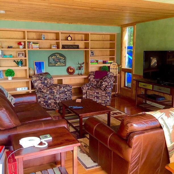 Den, Bookcase, TV & Game Table generous and comfortable seating beadboard ceiling and