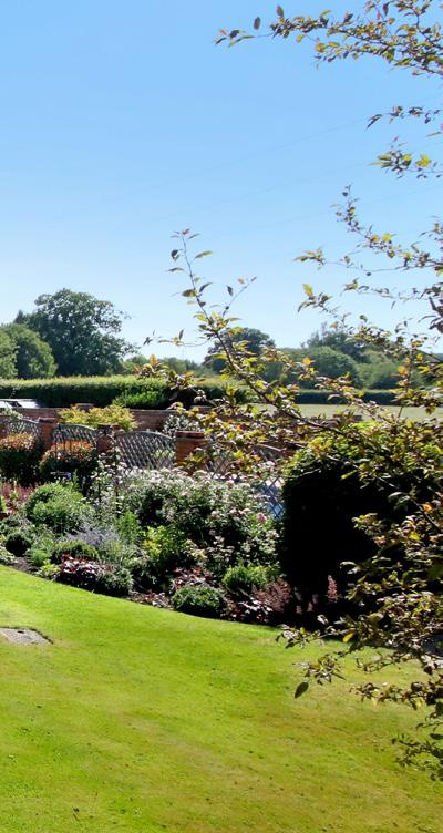 The Well House STRATFIELD SAYE HAMPSHIRE A charming Grade II listed country house set in stunning gardens in an attractive rural setting.