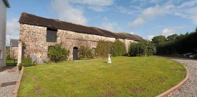 To one side there is an extensive barn which provides an adaptable range of workshops/storage space and the potential for the expansion of the accommodation or conversion to annexe/holiday units