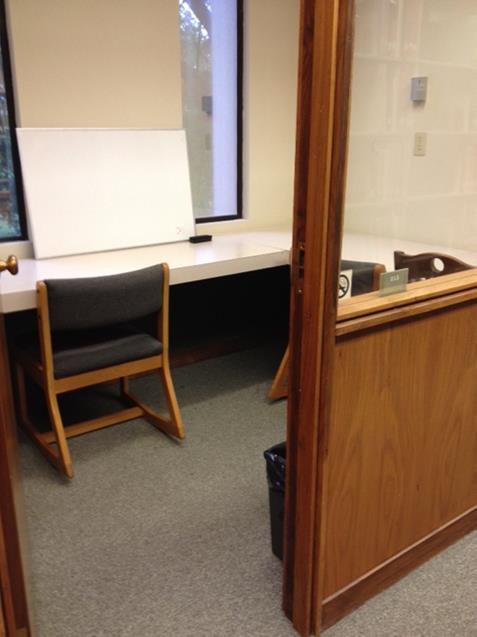 A small group study room with WiFi and a white board.
