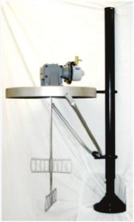 Figure 6 shows a back-geared agitator system with an air-operated elevator assembly for use with 55-gallon, open-top drums.