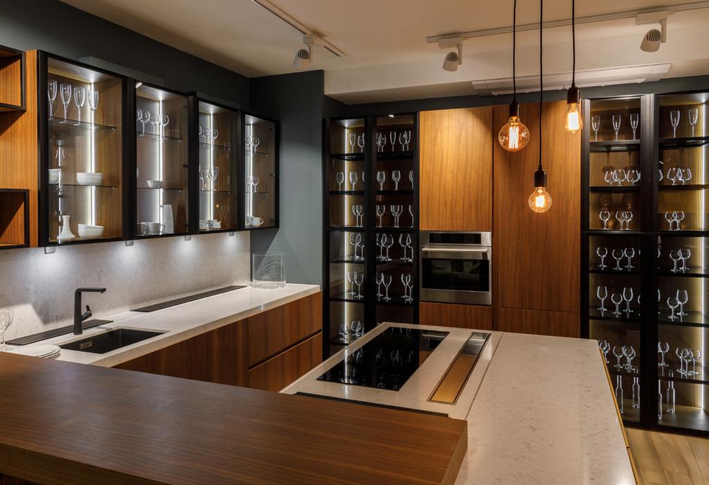 5. Putting a Modern Twist on Glass Clear glass fronts with black aluminum-framed doors Glass brings in light naturally and instantly makes a space feel airy and look brighter and larger.