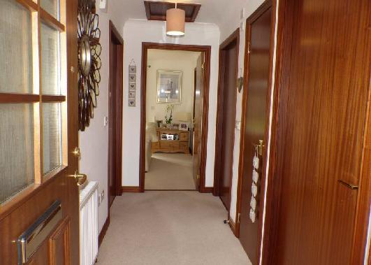 HALL 11'1 x 4'4 (3.38m x 1.32m) Exterior door with double glazed panel leads to a welcoming hall giving access to the accommodation. Storage cupboard. Access hatch to attic. BEDROOM 2 9'1 x 8'7 (2.