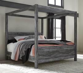 poster beds and king or queen sleigh beds B221 Baystorm Smokey gray finish over replicated oak grain with authentic touch Modern bookcase headboard features dimming LED light under shelf Bed offers