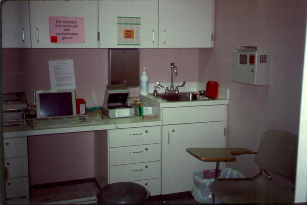 In the ambulatory care setting blood drawing is frequently done less than ideal situations. What wrong with this picture? Answer: Needle boxes are unsecured by the sink and monitor.