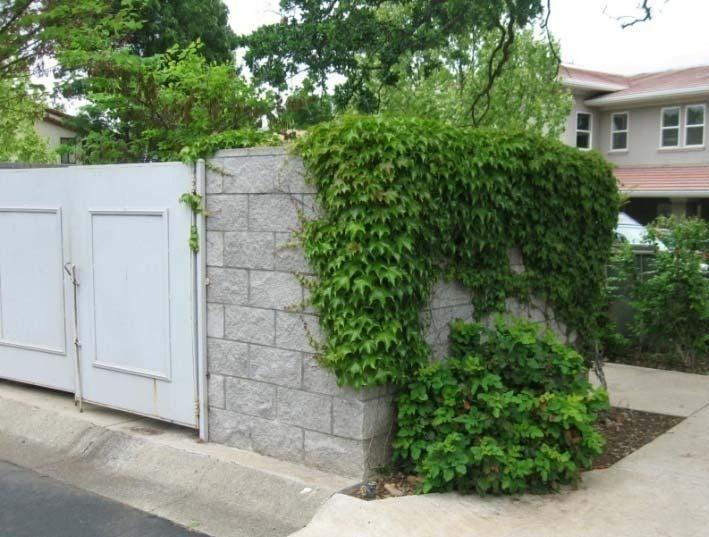35 - Screen and buffer trash enclosures, storage areas, expansive paving, service yards, and