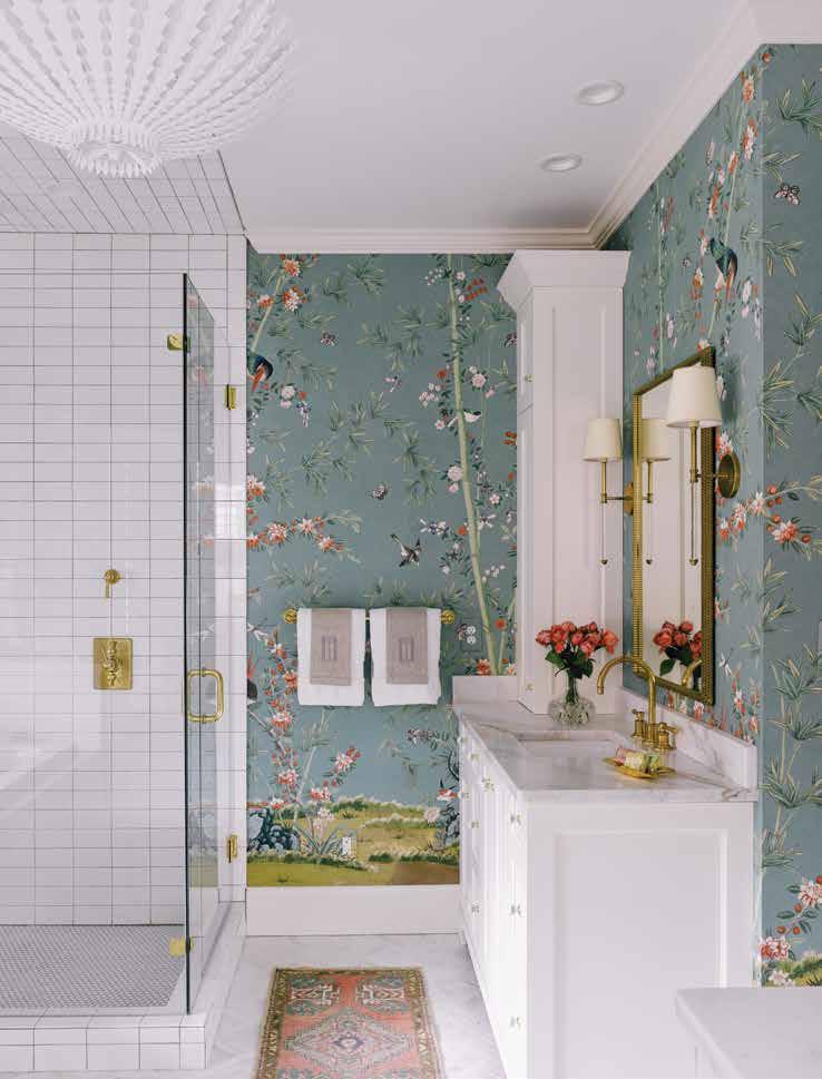 Miles Redd wallpaper for Schumacher fills this master bathroom with romance and happiness.