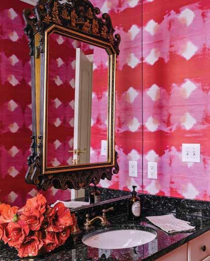 Right: Charlotte Lucas left this existing powder room untouched in the design plan, opting to work with the bright palette instead of changing it.