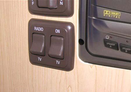 The speaker selector switch must be in TV position to enable the deluxe sound speakers while watching a DVD or TV. This switch is near the DVD player.