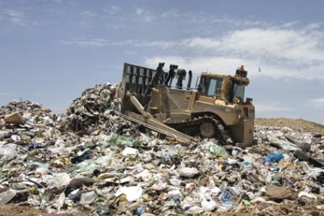 Figure 7: Track type tractor. Figure 8: Track type loader Landfill compactors are equipped with a large capacity blade, enabling the machine to push large quantities of waste.