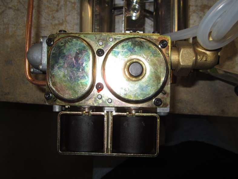 Remove the solenoid Adjust the new solenoid Remove the black blanking plug Turn the screw in