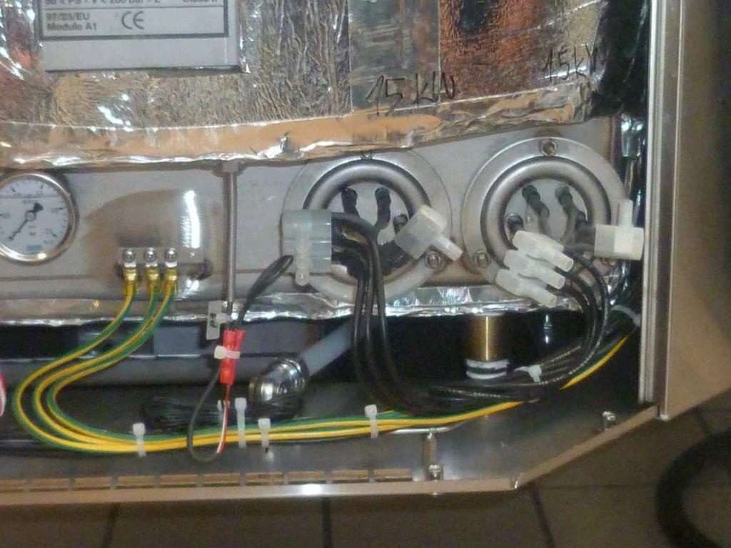 electrically Undo the 3 terminal screws Withdraw the immersion heaters wires Remove the