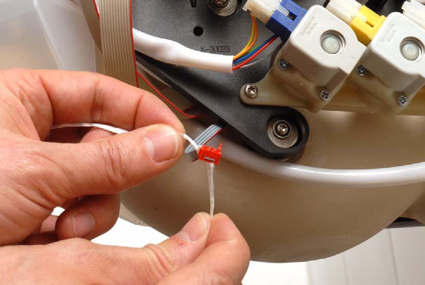 20 Hold the storage water heater and disconnect both connectors from the