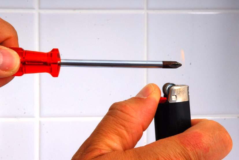 10 If the dryer arm is jammed, heat the screwdriver and push it into the dryer nozzle. 14 Close the stop valve.