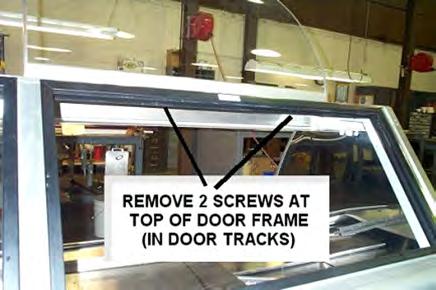 P/N 0518669_G 1-7 4. Remove screws at top of rear door frame. The bottom screws do not need to be removed.