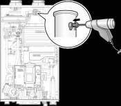 Loosen the screw, rotate the plate and remove the gasket to access the emissions monitoring port as shown in Figure 7. b.