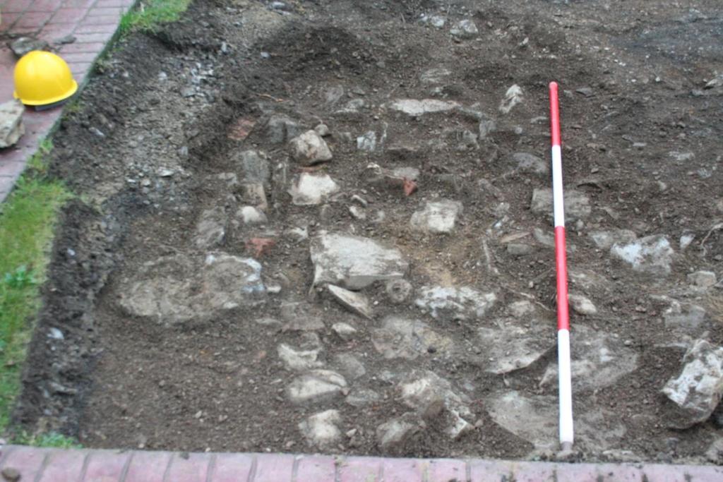 Cement base, possibly for gate post Plate 5: Stone layer (C104), looking north.