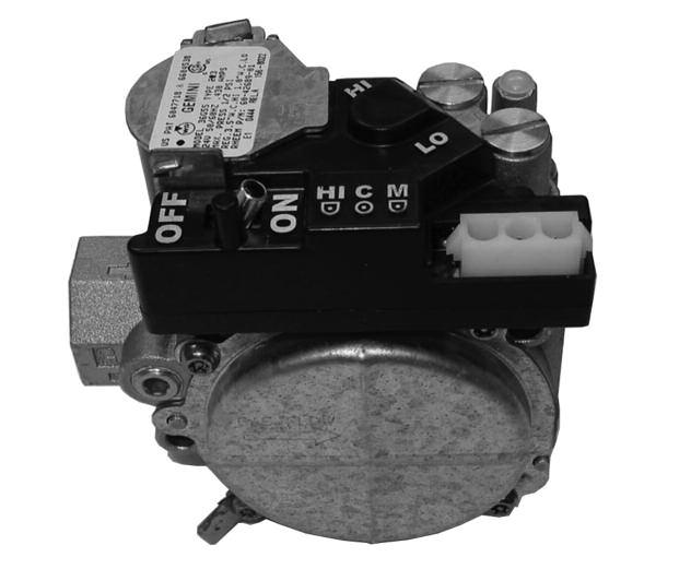 FIGURE 5 TYPICAL GAS VALVE GAS VALVE #60-101921-02 GAS CONTROL SWITCH HIGH FIRE ADJUSTMENT LOW FIRE ADJUSTMENT MAINTENANCE It is recommended for safety and proper furnace operation that a seasonal