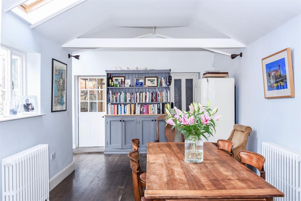 80m (5' 11") The rear hallway leading off from the front of the property has original floor boards, restored old school radiator, large cupboard containing 'Worcester' boiler unit and water softener,