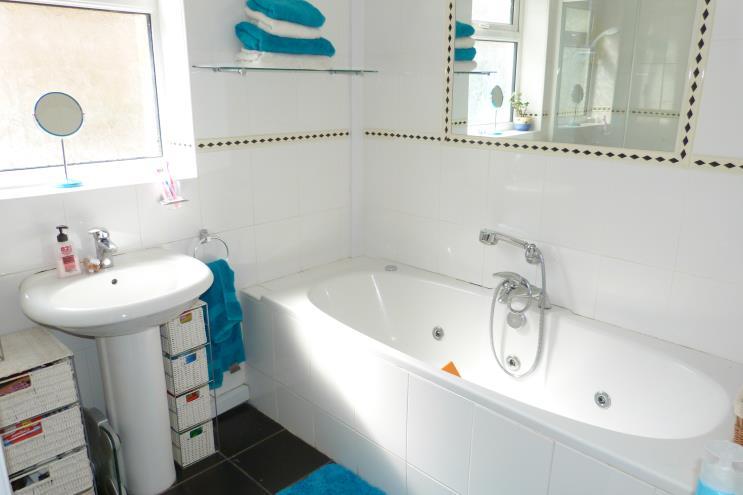 GROUND FLOOR BATHROOM BEDROOM TWO Luxury fitted bathroom suite with