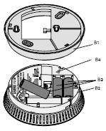 Mounting the Mounting the DELTA reflex smoke detector Open the 2-sectional device (base B1 and smoke detector B2 ) by holding firmly the base and turning the detector counterclockwise Secure the base