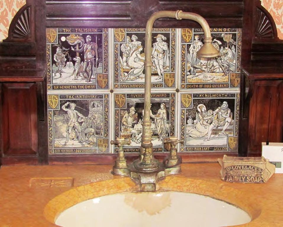 Victorian wash-basin with a tiled splash-back of Mintons China Works tiles designed by John Moyr