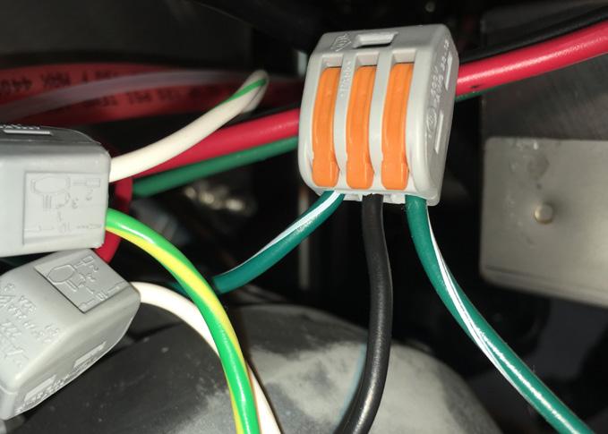 Locate 2-way gray/orange splicing connector with a green/white
