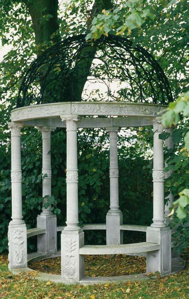 The Estate Temple [item 61] Hand carved from solid natural limestone, the domed wrought iron roof, surmounted by tulip and rose finials, rests upon a highly sculpted frieze having carved swags of