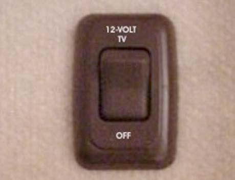 Front TV Ignition Switch Interlock -Typical View SWING-OUT TV MOUNTS If Equipped Swing-out TV s are powered by an electrical connection with a built-in ignition switch interlock.