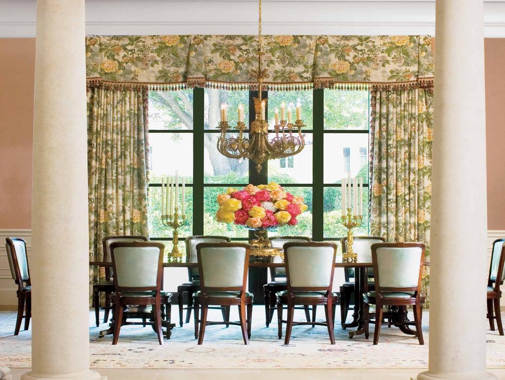 Lee Jofa s hand-blocked Chinese Lantern textile, seen on the dining room draperies, sets the palette for the home s public spaces.