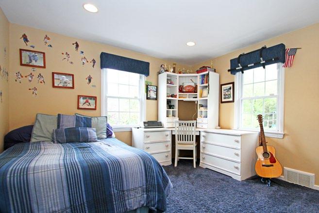 The remaining two bedrooms enjoy the cozy comfort of wall-to-wall carpeting