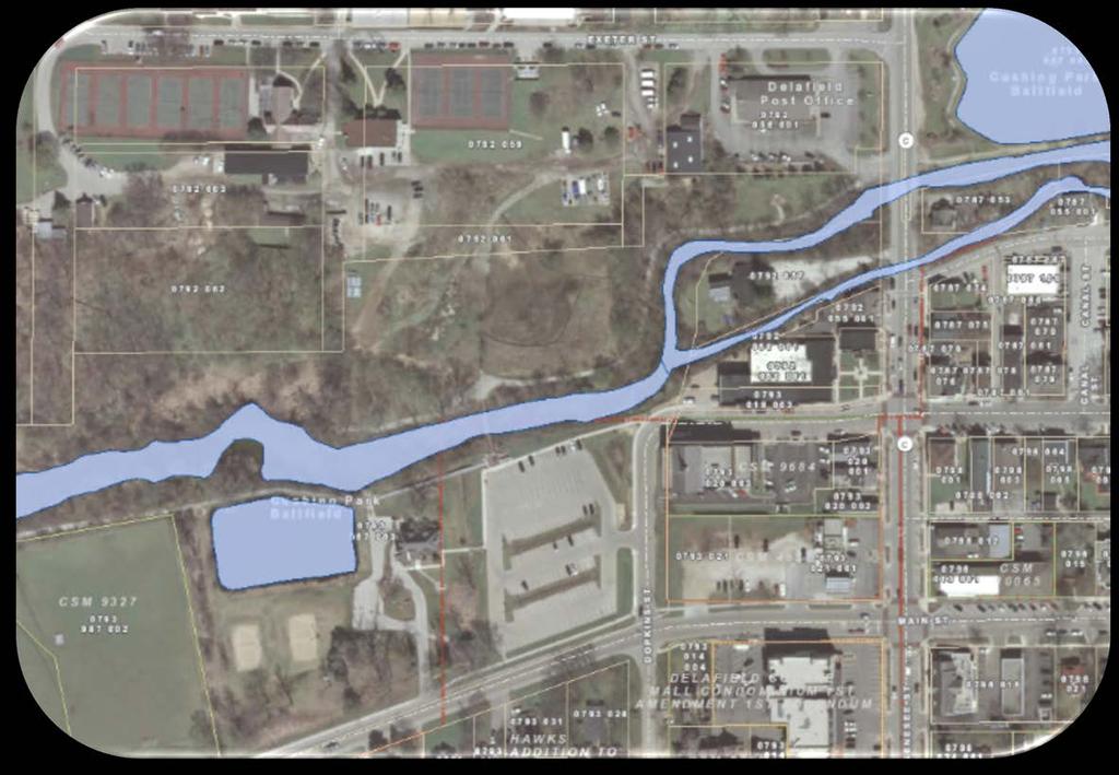 CURRENT CONDITION Overhead view of the parcel of land to be designated as Liberty Park. The property is owned by the City of Delafield.