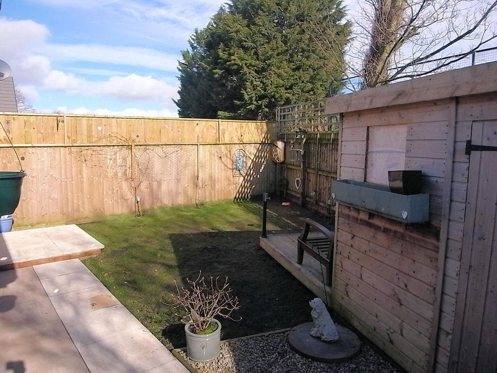 To the rear there is an attractive and private garden with paving, lawn and decking. Buildings include a useful timber garden shed 2.94m x 2.